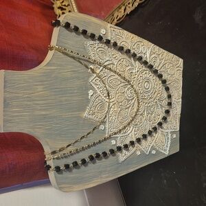 Elegant Multi-Layered Gold and Black Necklace